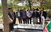 غبارروبی و عطرافشانی مزار شهدا با حضور مدیریت شبکه بهداشت و درمان